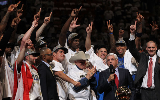 David Stern presents the Larry O'Brien Trophy to Mark Cuban and the Dallas Mavericks after Game 6 of the NBA Finals